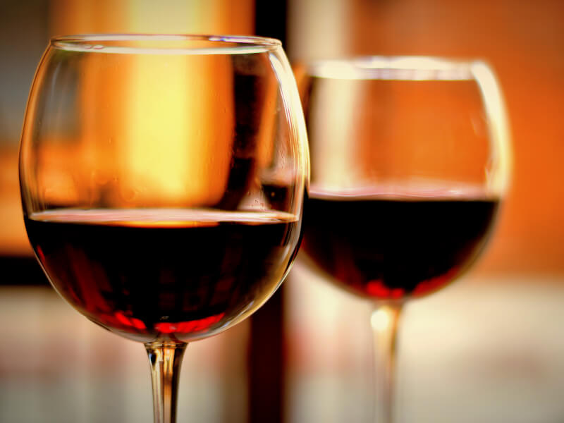 Two red wine glasses of Barbera wine